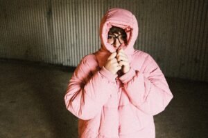 a person in a pink garment