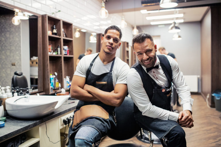 a couple of men sitting in a room